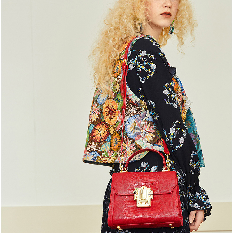 Designer Serpentine Lock Handbag